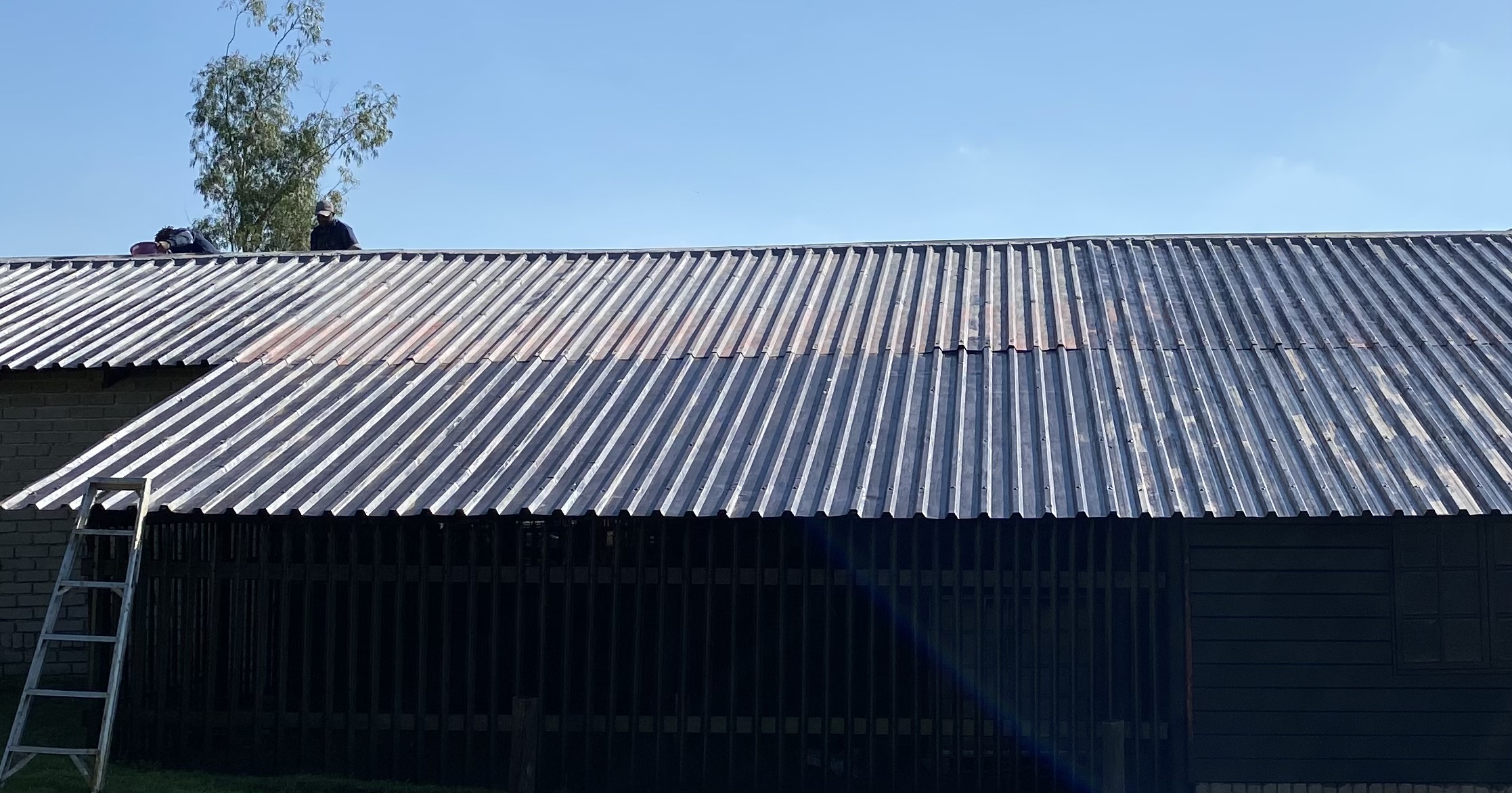 Nachwa team carrying out roof repair and maintenance on site in Secunda