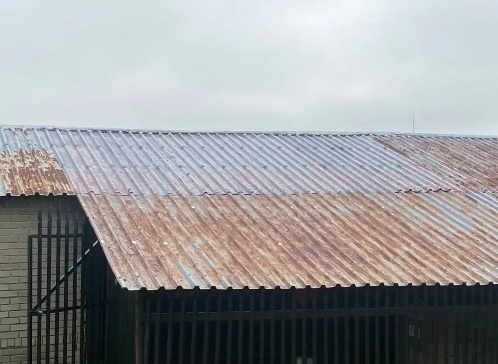 Roof rust repair and repaint project in Secunda